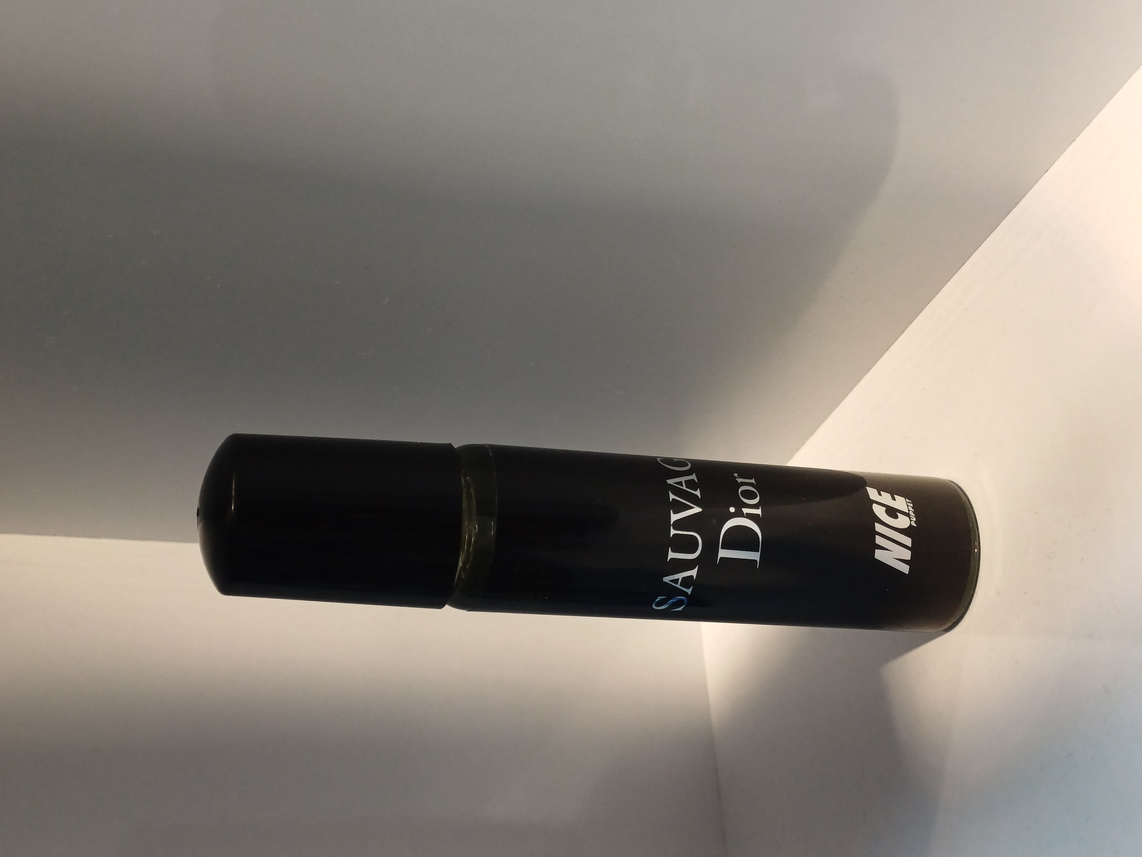 عطر جیبی مردانه مدل sauvage